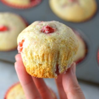 Healthy Strawberry Muffins made with olive oil. This is a great recipe to make as a nut free snack to bring to work, or a quick and easy grab and go breakfast idea.