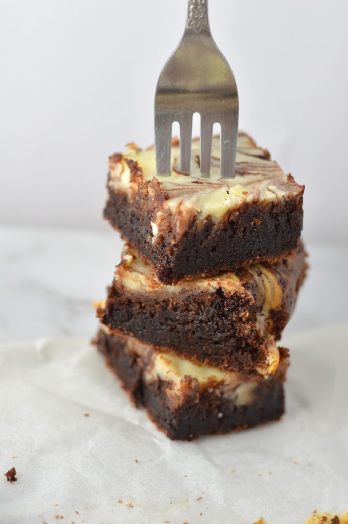 The best Marble Cream Cheese Brownie made from scratch. Fudgy, chocolatey and so easy to make, these will become your new favourite dessert.