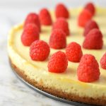 Healthy Greek Yogurt Raspberry Cheesecake recipe. Less calories and fat than your typical cheesecake, and tastes virtually the same!