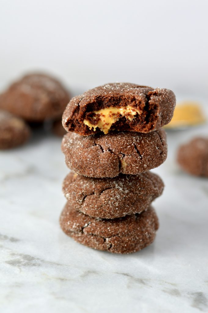 Easy Chocolate Peanut Butter Filled Cookies Recipe. Bite sized and super soft, they make a great dessert or snack idea.