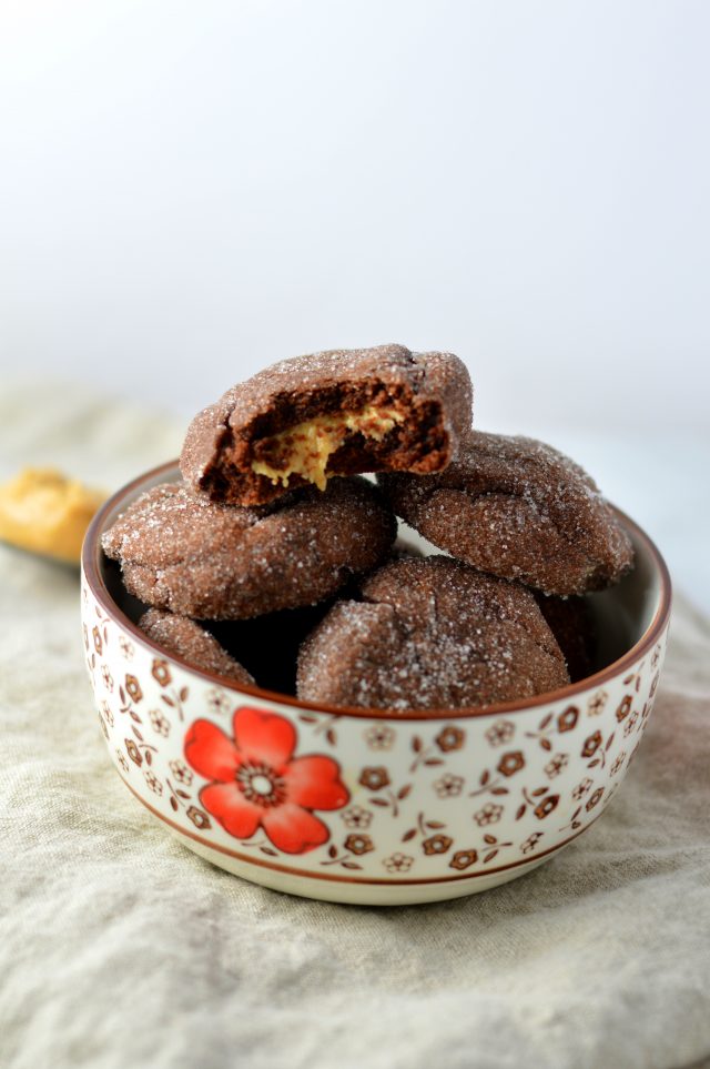 Easy Chocolate Peanut Butter Filled Cookies Recipe. Bite sized and super soft, they make a great dessert or snack idea.