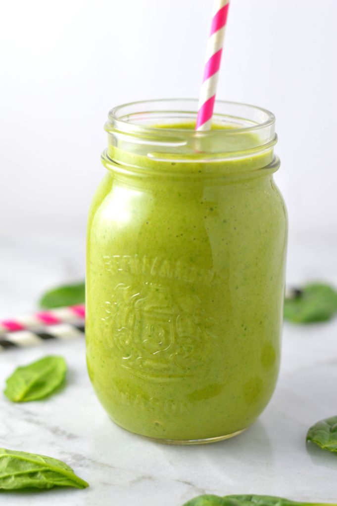 Easy Mango Green Smoothie recipe. Made with spinach and bananas, this healthy drink recipe is healthy and vegan and makes a great breakfast idea