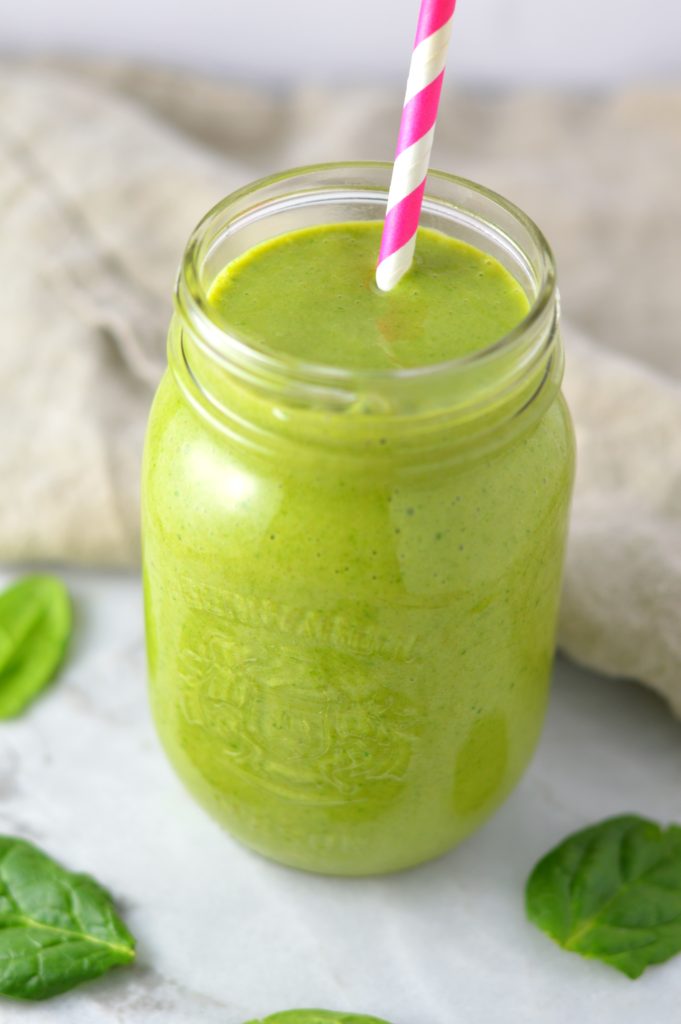 Easy Mango Green Smoothie recipe. Made with spinach and bananas, this healthy drink recipe is healthy and vegan and makes a great breakfast idea