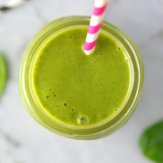 Easy Mango Green Smoothie recipe. Made with spinach and bananas, this healthy drink recipe is healthy and vegan and makes a great breakfast idea