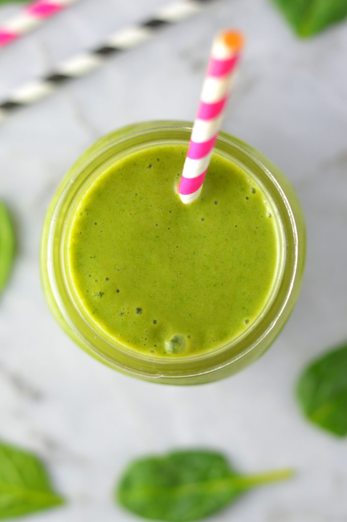 Easy Mango Green Smoothie recipe. Made with spinach and bananas, this healthy drink recipe is healthy and vegan and makes a great breakfast idea