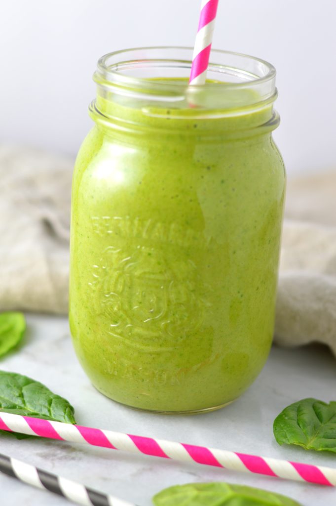 Easy Mango Green Smoothie recipe. Made with spinach and bananas, this healthy drink recipe is healthy and vegan and makes a great breakfast idea