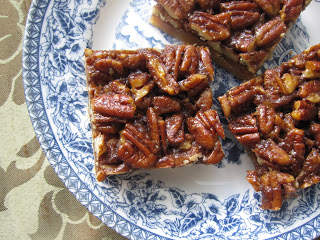 These are the best ever Pecan Squares. Made without corn syrup and with whole wheat, these are healthier than your average pecan squares.