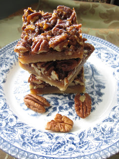 These are the best ever Pecan Squares. Made without corn syrup and with whole wheat, these are healthier than your average pecan squares.