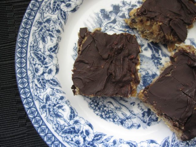 Homemade Coconut Chocolate Protein Squares made with peanut butter and sweetened with one ripe banana, this makes the perfect post workout snack.