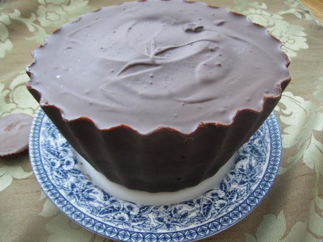 GIANT Reeses peanut butter cup cake recipe. So rich and chocolatey, you will need to have a slice with a cup of coffee.