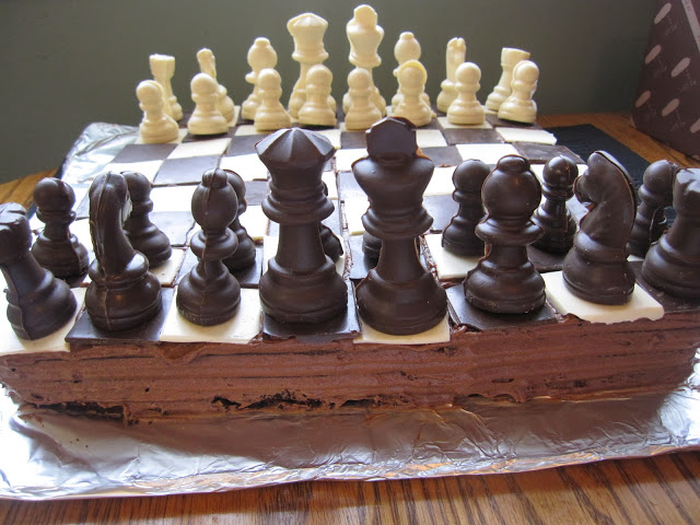 This Chess Board Cake is the perfect recipe for birthdays, anniversaries or any special occasion. Made with chocolate chess pieces.