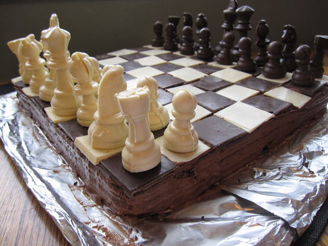 This Chess Board Cake is the perfect recipe for birthdays, anniversaries or any special occasion. Made with chocolate chess pieces.