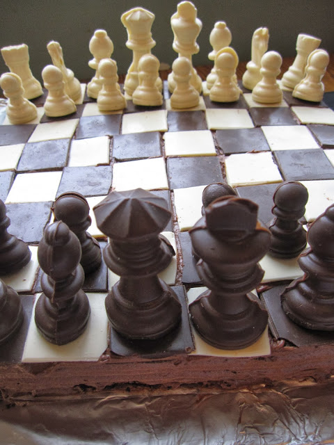 This Chess Board Cake is the perfect recipe for birthdays, anniversaries or any special occasion. Made with chocolate chess pieces.