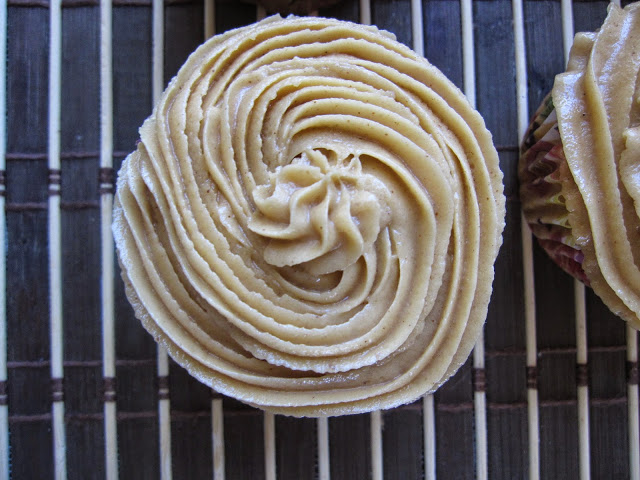 These Vanilla Bean Cupcakes with Peanut Butter Frosting are the perfect dessert recipe. Moist cupcakes with a peanut butter cup inside.