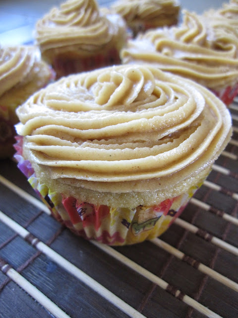 These Vanilla Bean Cupcakes with Peanut Butter Frosting are the perfect dessert recipe. Moist cupcakes with a peanut butter cup inside.