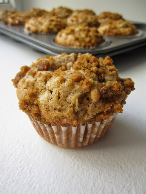 These moist Apple Streusel Muffins are a great great grab and go breakfast recipe. Flavoured with cinnamon and made with both shredded and cubed apples.