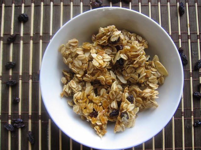 Healthy Sweet and Salty Coconut Vanilla Bean Granola made with coconut oil, raisins and almonds. One of my favourite breakfast recipes.