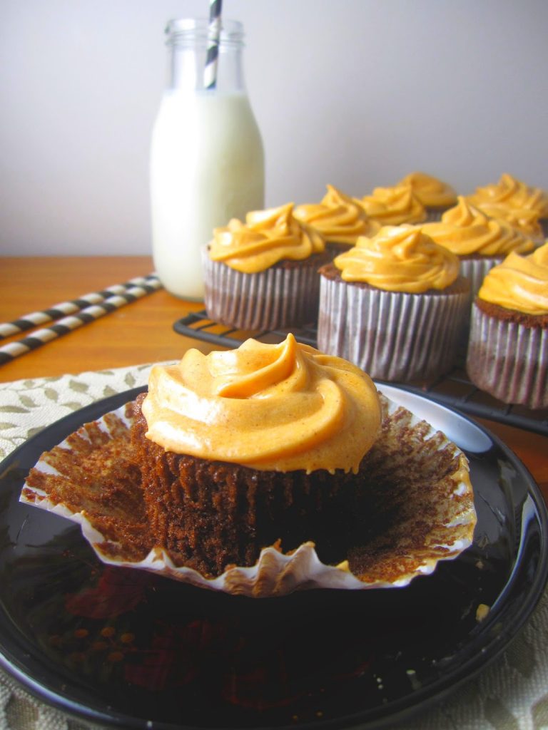 These Spiderweb Cupcakes are perfect for Halloween desserts. Made with a chocolate spiderweb to decorate the cake and orange colored frosting.