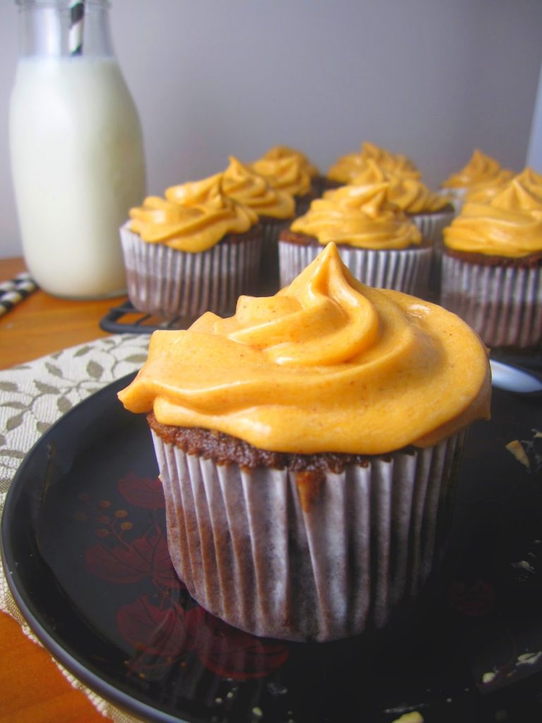 These Spiderweb Cupcakes are perfect for Halloween desserts. Made with a chocolate spiderweb to decorate the cake and orange colored frosting.