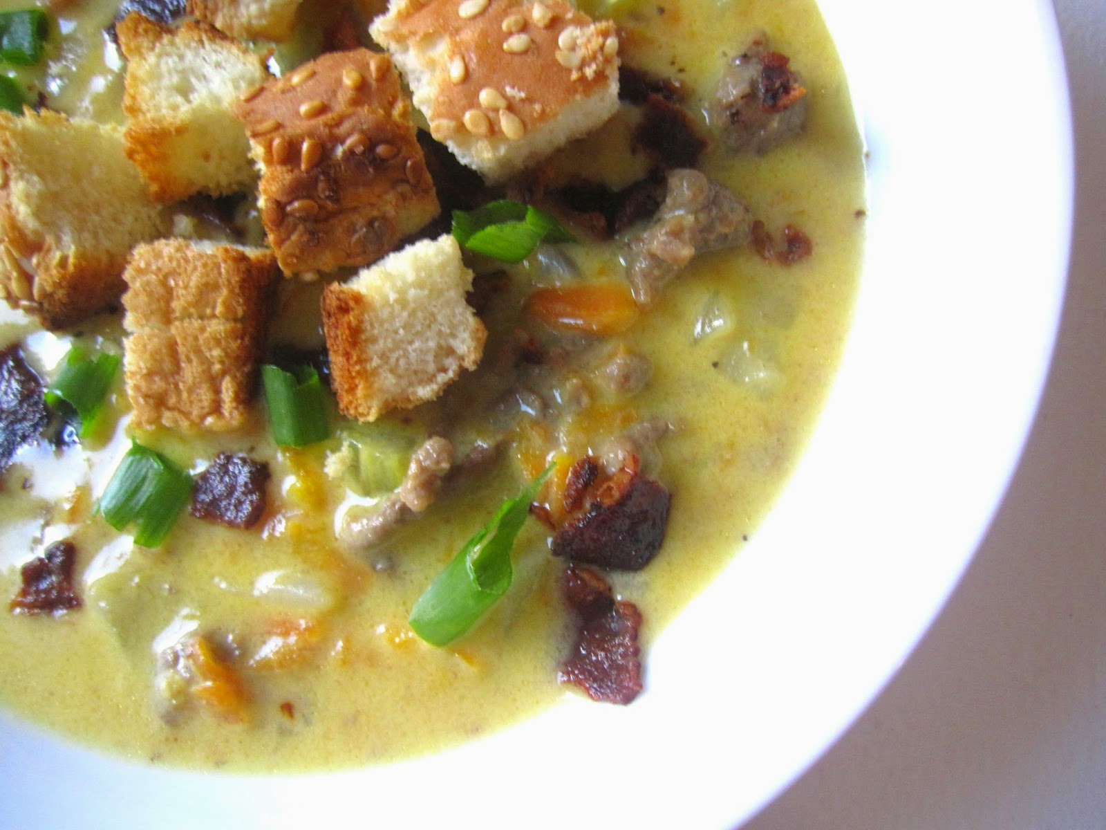 This easy Cheeseburger Soup with hamburger bun croutons makes a regular appearance in my kitchen for dinner. One of my favourite ground beef recipes.