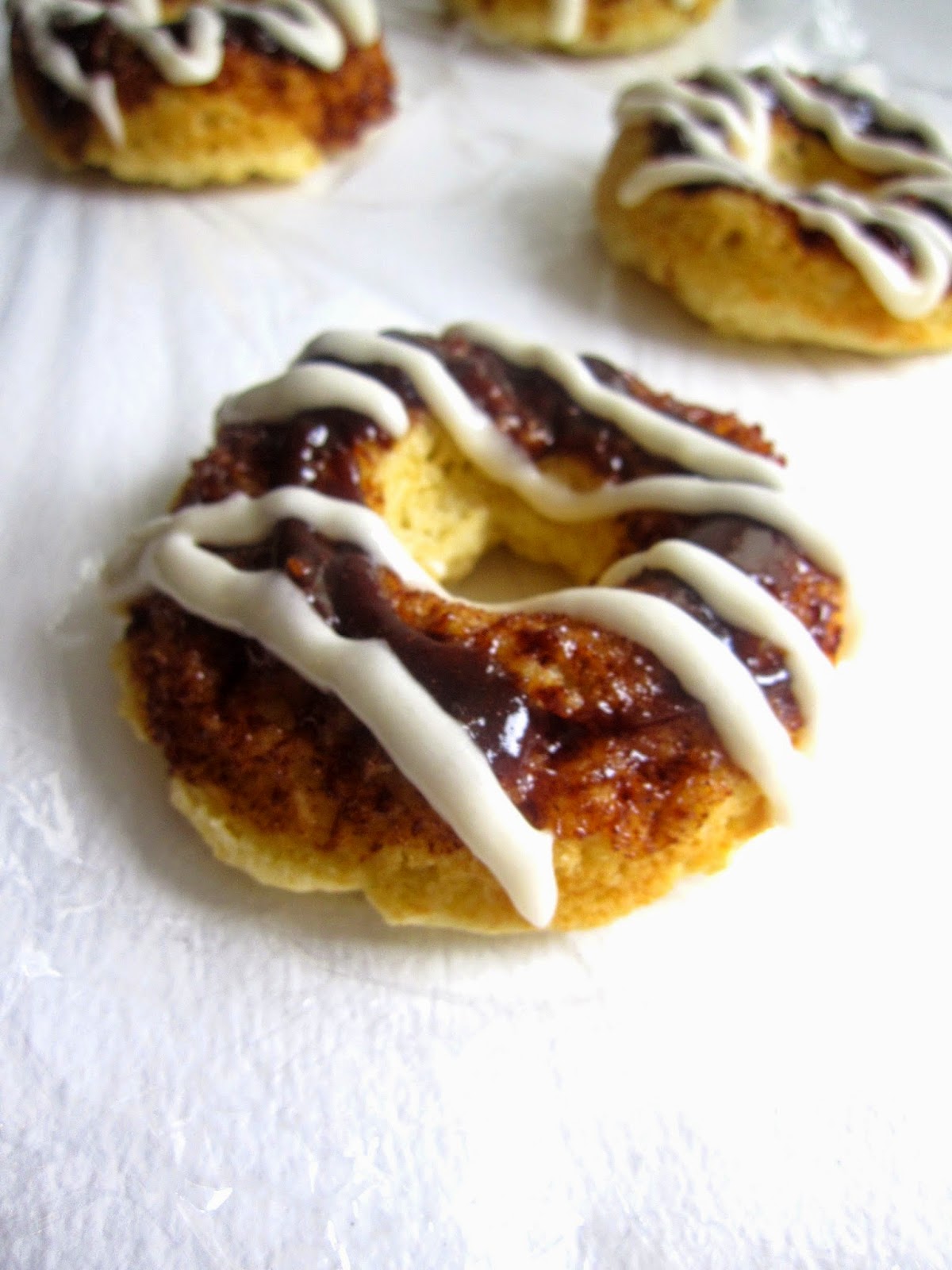 These Cinnamon Roll Baked Doughnuts are made without yeast, and make the perfect breakfast. The cream cheese frosting is optional but highly recommended.