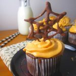 These Spiderweb Cupcakes are perfect for Halloween desserts. Made with a chocolate spiderweb to decorate the cake and orange colored frosting.