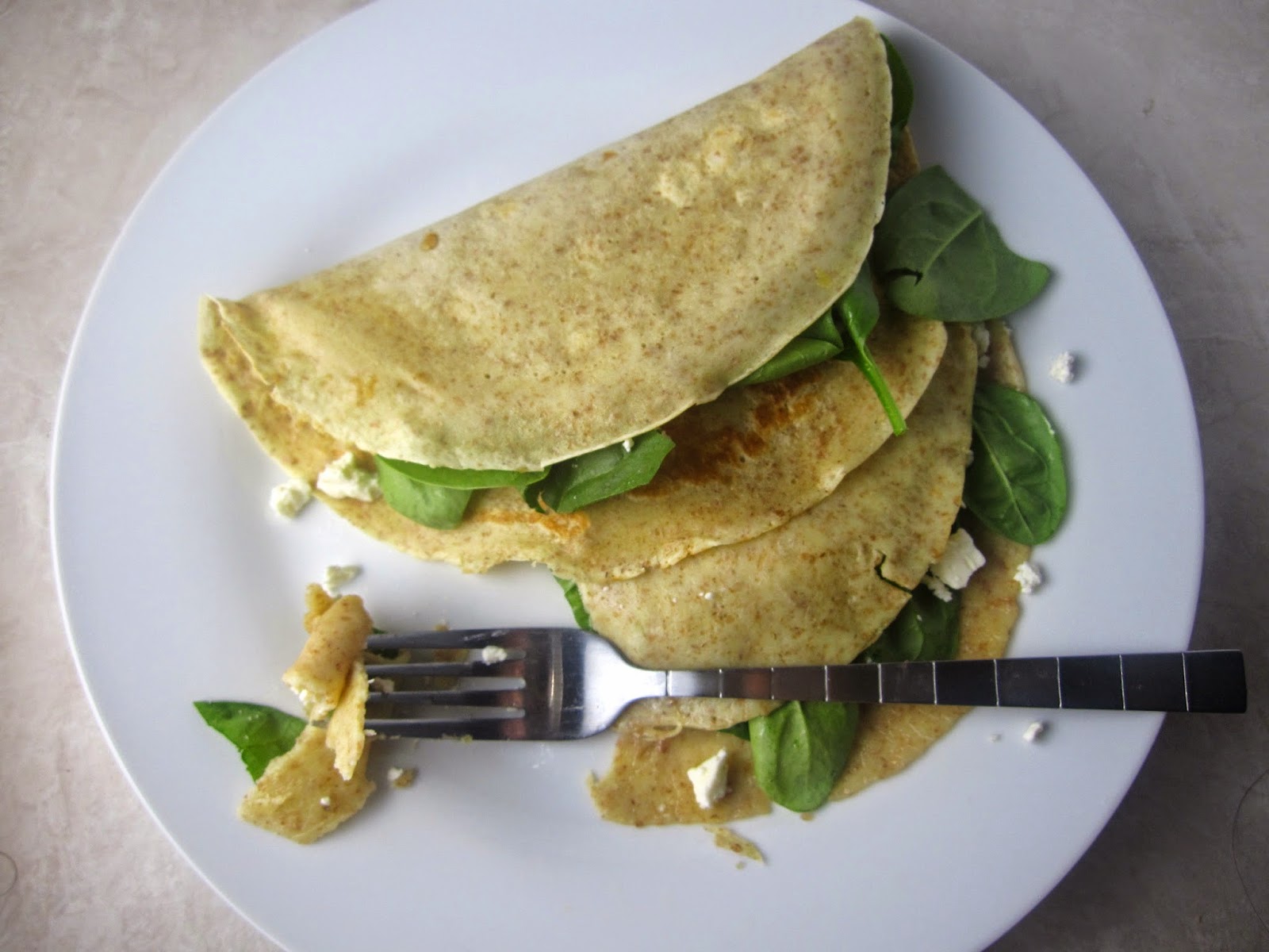 These Whole Wheat Spinach and Feta Crepes make a regular appearance in my house. So quick and easy to make, this makes a great lunch or dinner recipe.