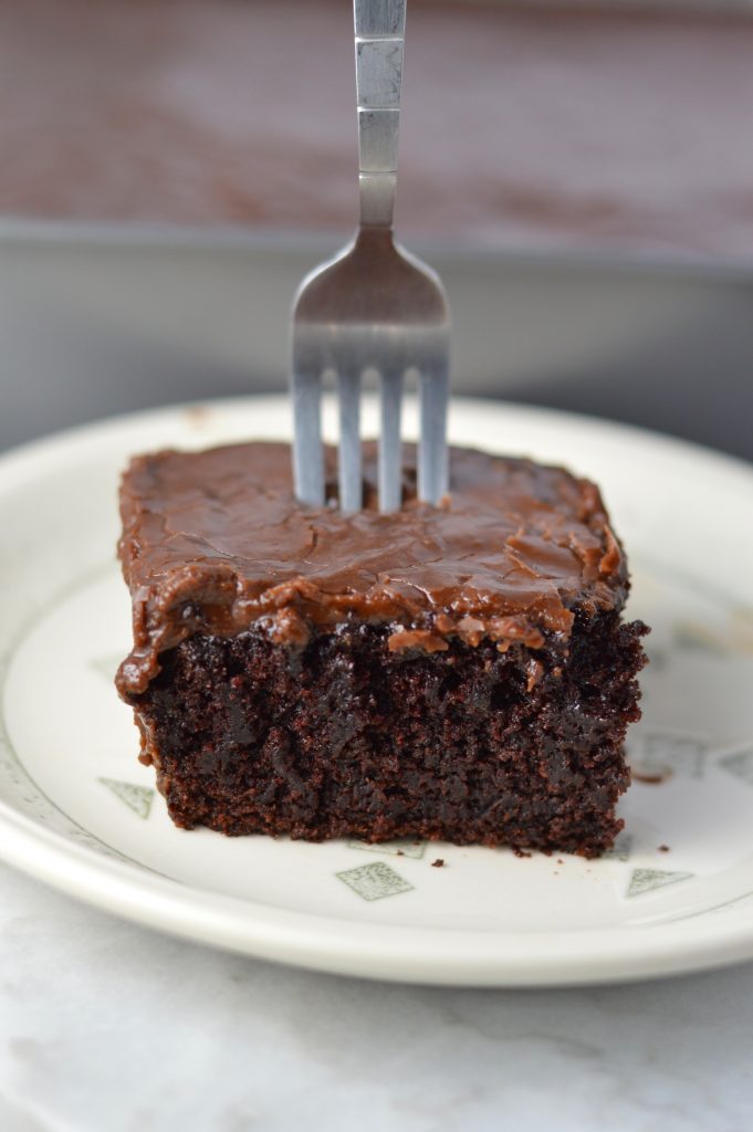 Impress everyone with this moist Chocolate Cake with Thick Chocolate Icing recipe from scratch. So easy to make, make it as a birthday dessert.