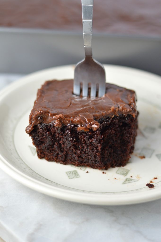 Impress everyone with this moist Chocolate Cake with Thick Chocolate Icing recipe from scratch. So easy to make, make it as a birthday dessert.