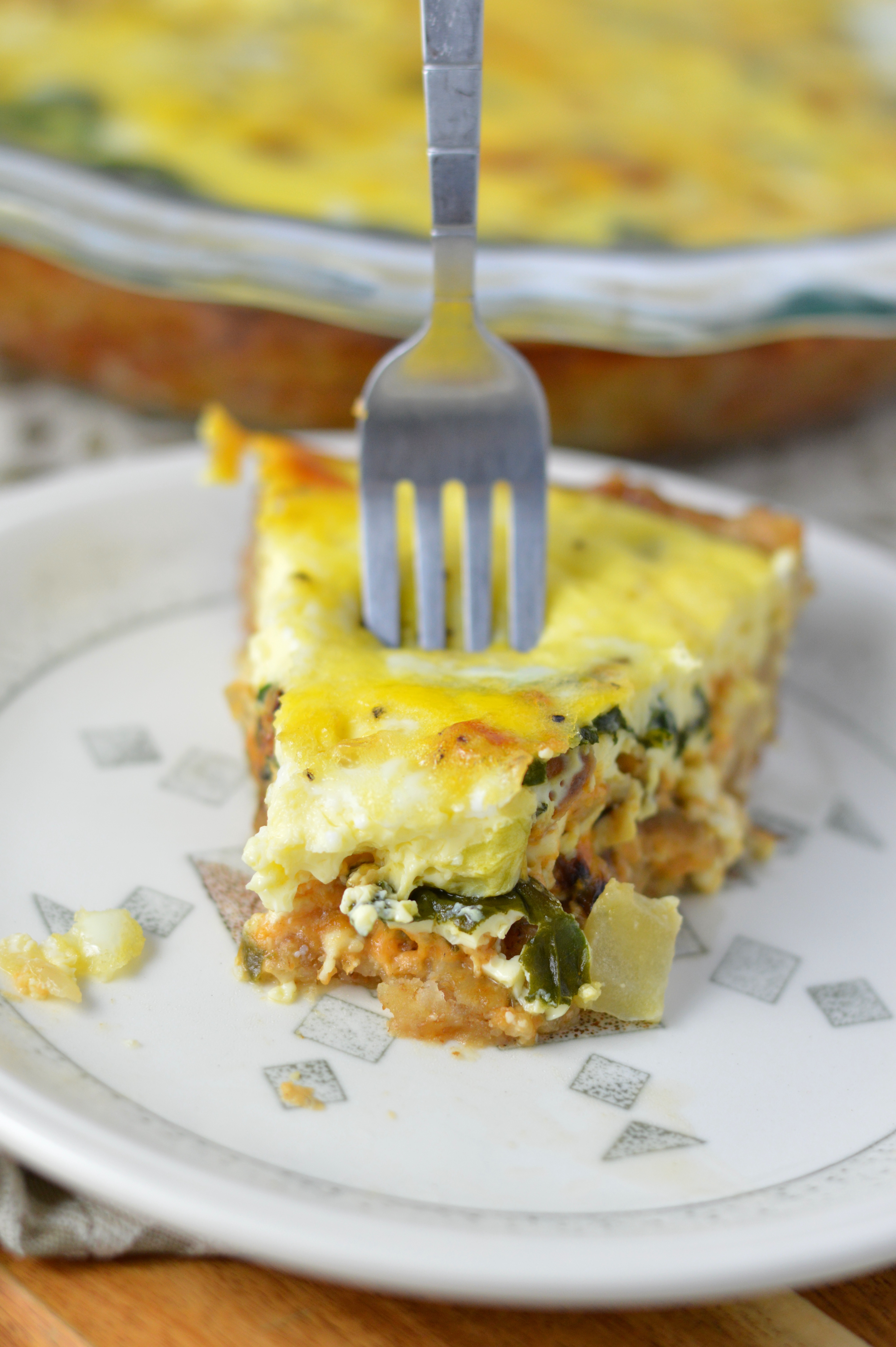 This Spinach and Feta Quiche is made with fresh baby spinach, crumbled feta and homemade crust. One of my favourite dinner recipes.