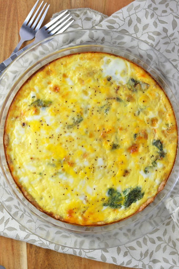 This Spinach and Feta Quiche is made with fresh baby spinach, crumbled feta and homemade crust. One of my favourite dinner recipes.