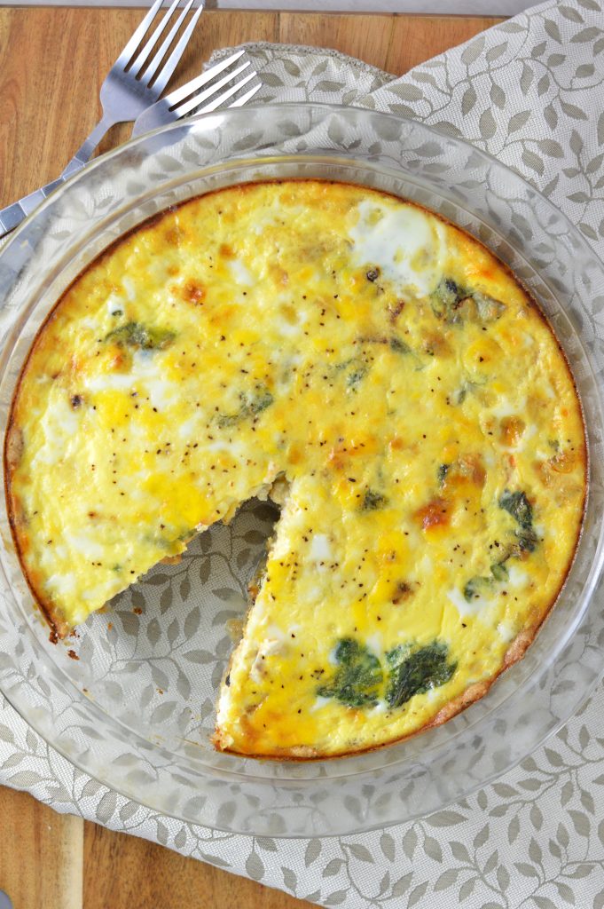 This Spinach and Feta Quiche is made with fresh baby spinach, crumbled feta and homemade crust. One of my favourite dinner recipes.