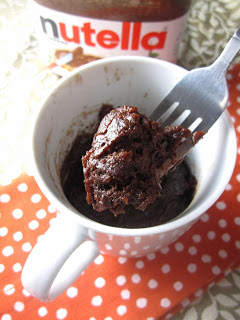 Microwave Banana Nutella Mug Cake made without self rising flour. This cake doesn't use eggs, this makes the perfect last minute dessert recipe.