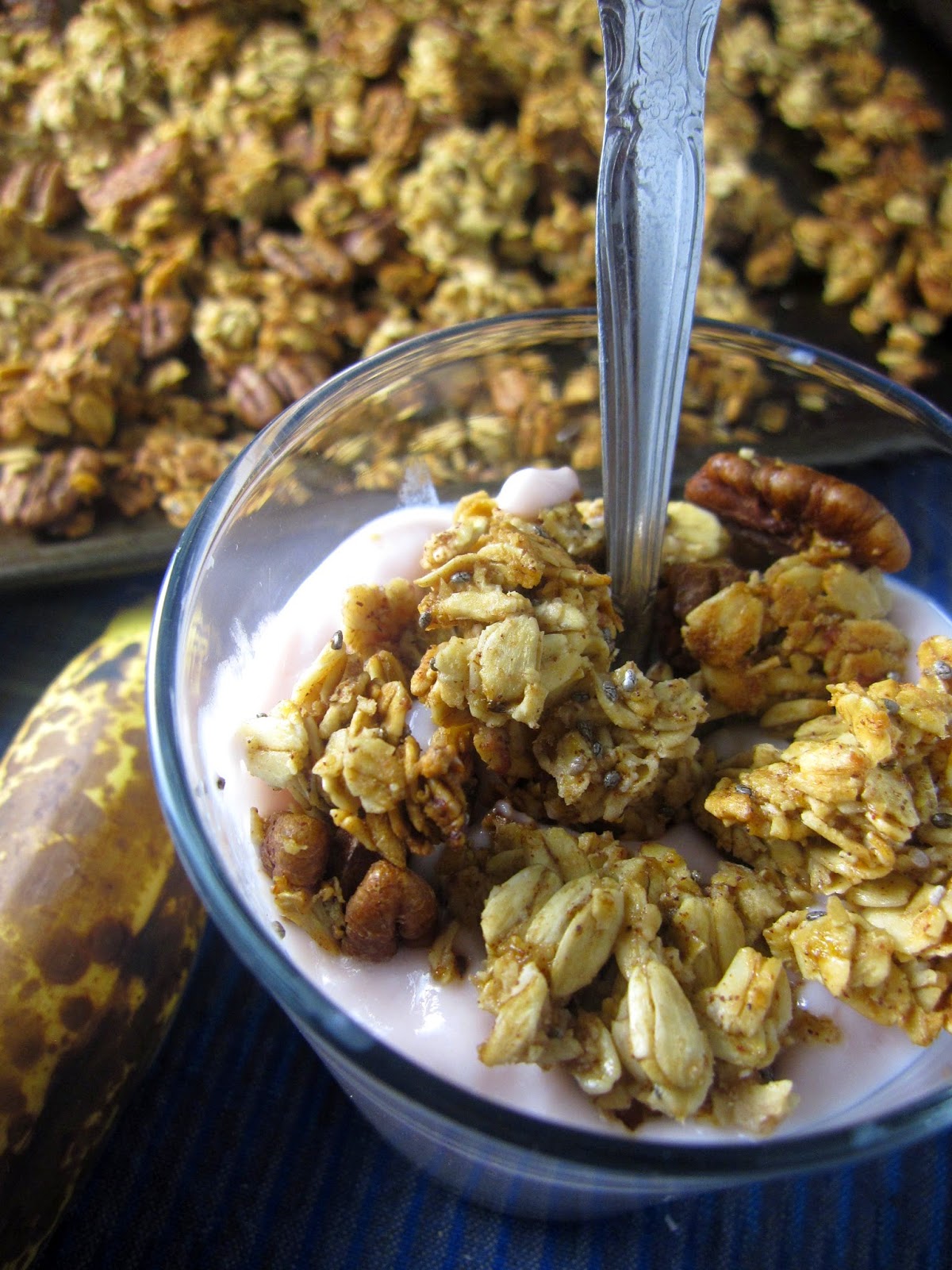 Banana Bread Granola that uses one ripe banana, coconut oil and pecans. Perfect for breakfast or snacking on during the day.