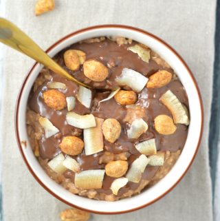 Microwave Peanut Butter, Nutella and Coconut Oatmeal. Ready in less than 5 minutes. Such an easy and comforting breakfast!