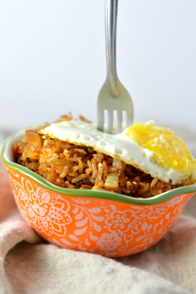 This Kimchi Fried Rice is so easy to make, and is a great way to use up your day old rice. Topped with a fried egg so that you can have some egg yolk sauce!