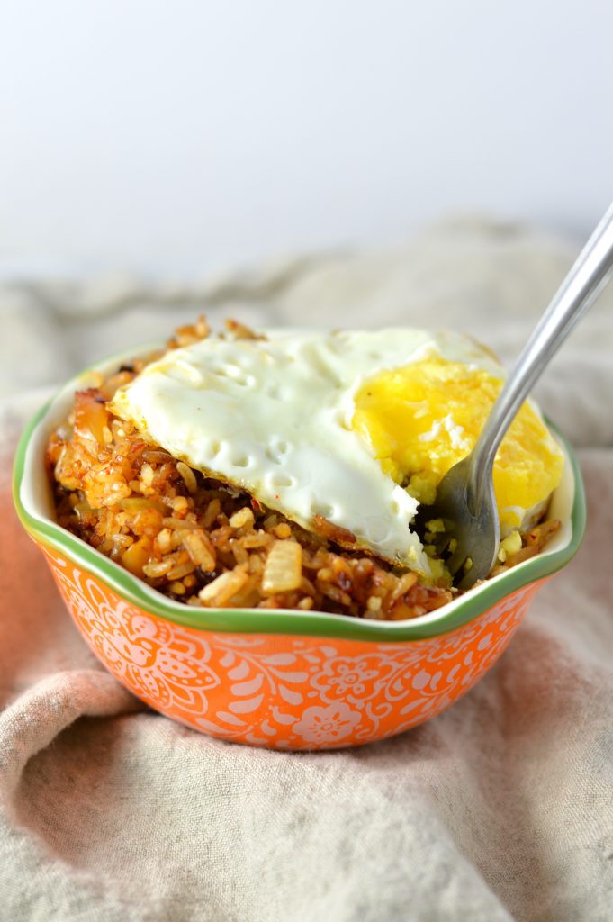 This Kimchi Fried Rice is so easy to make, and is a great way to use up your day old rice. Topped with a fried egg so that you can have some egg yolk sauce!