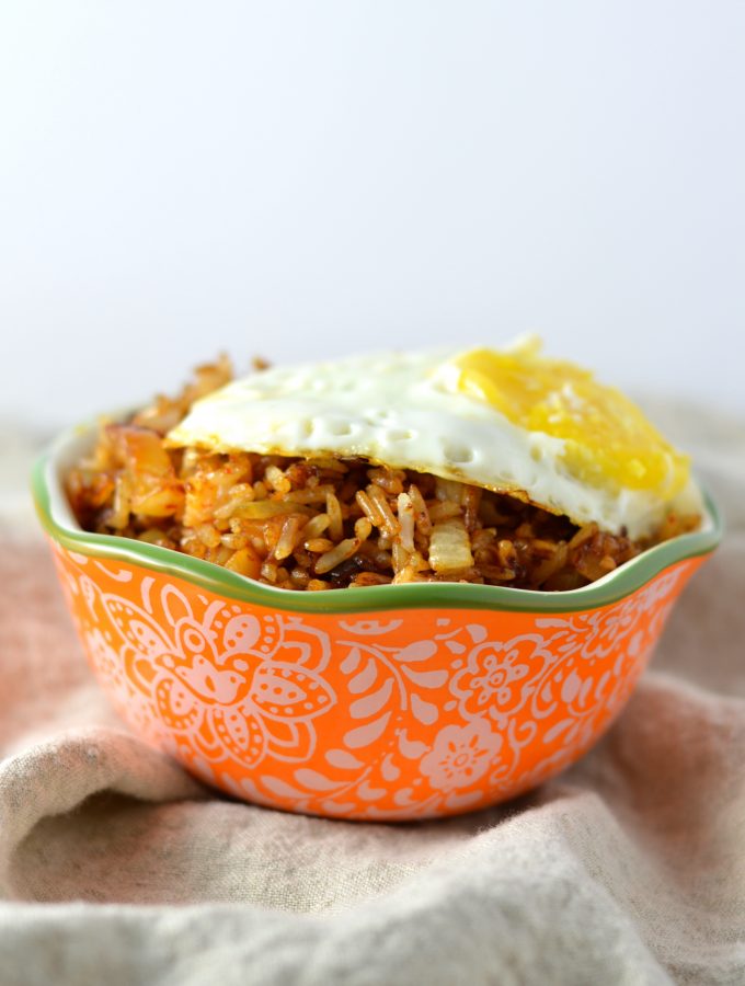 This Kimchi Fried Rice is so easy to make, and is a great way to use up your day old rice. Topped with a fried egg so that you can have some egg yolk sauce!