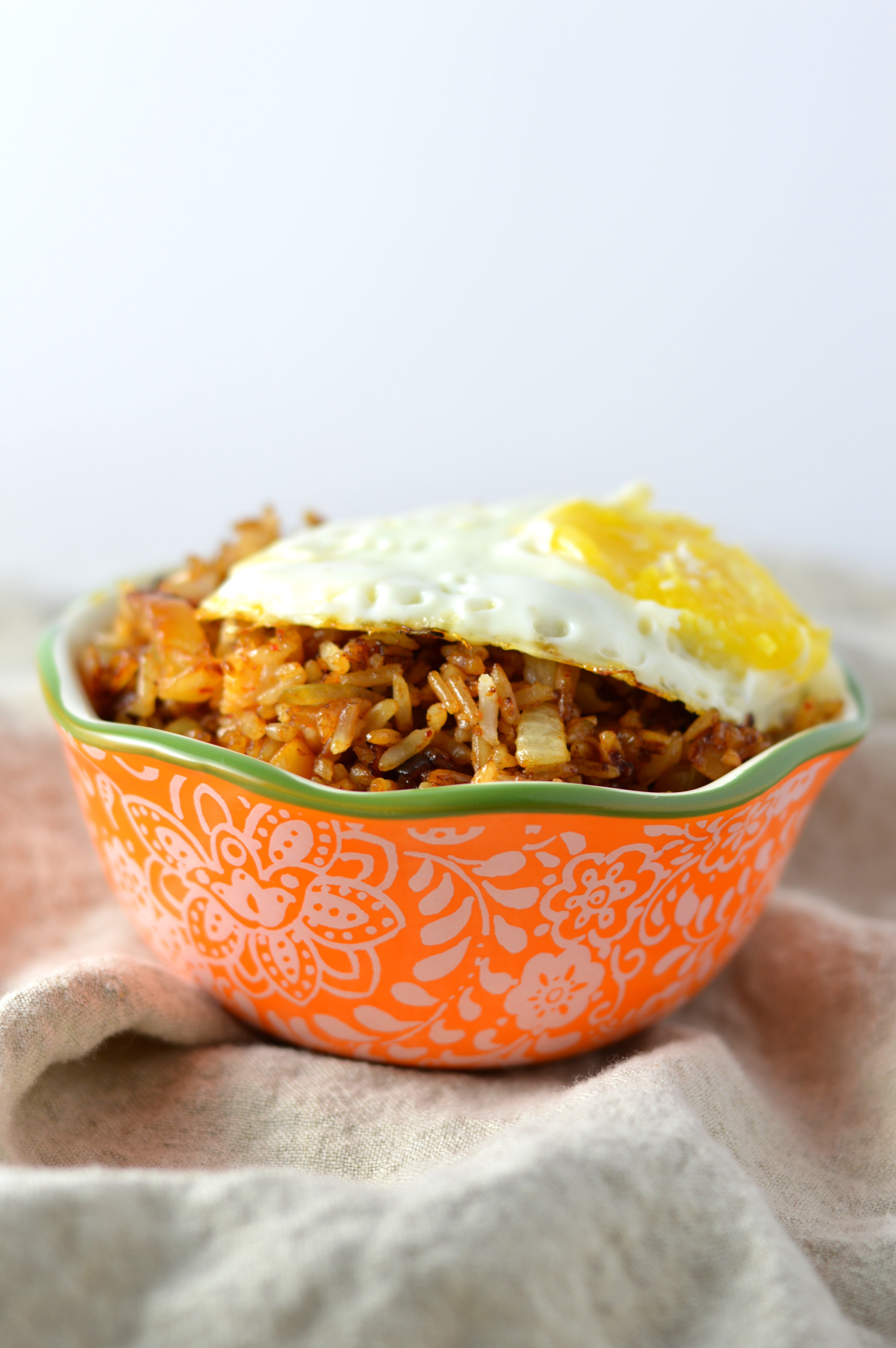 This Kimchi Fried Rice is so easy to make, and is a great way to use up your day old rice. Topped with a fried egg so that you can have some egg yolk sauce!