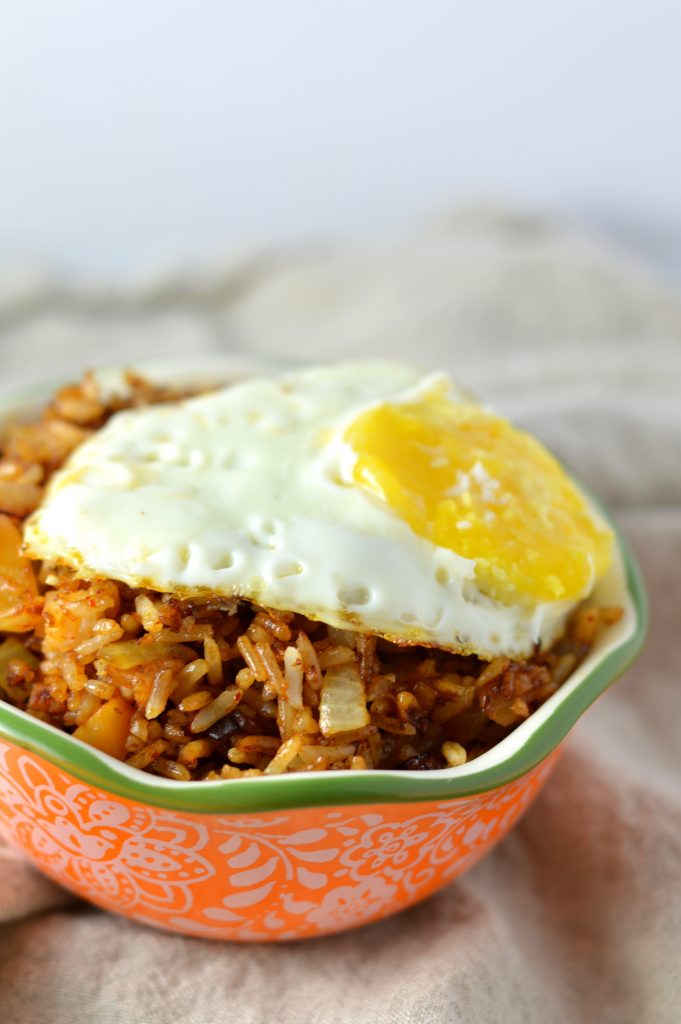 This Kimchi Fried Rice is so easy to make, and is a great way to use up your day old rice. Topped with a fried egg so that you can have some egg yolk sauce!