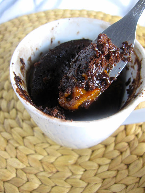 Caramel Stuffed Chocolate Mug Cake that is made in the microwave. When you want a dessert recipe made in under 5 minutes.