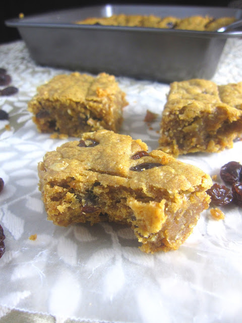 Healthy Peanut Butter and Raisin Oatmeal Bars make for a good breakfast, snack or healthy dessert recipe. Made with whole wheat flour.