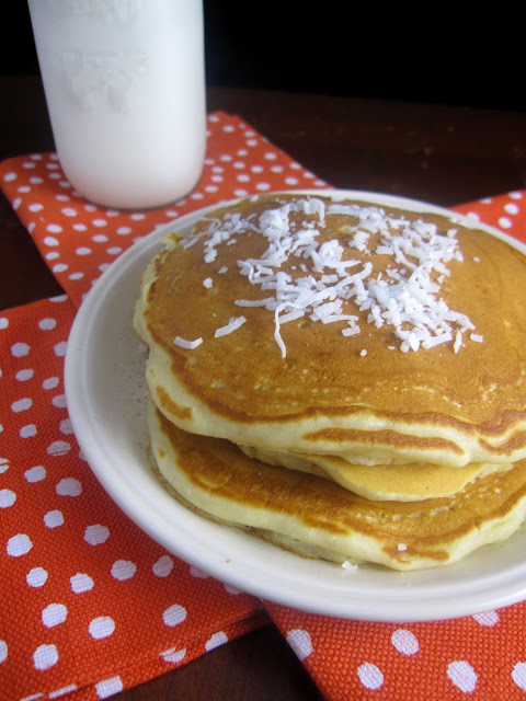 Fluffy coconut pancakes makes a delicious quick and easy breakfast recipe. Made with coconut milk and shredded coconut.