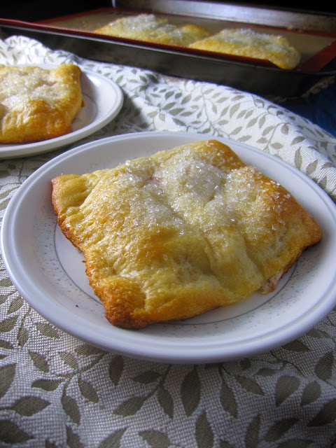 Easy Strawberry Raspberry Cream Cheese Danishes made with refrigerated crescent rolls, fresh strawberries and raspberry jam.