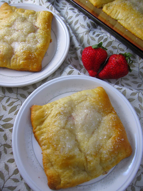 Easy Strawberry Raspberry Cream Cheese Danishes made with refrigerated crescent rolls, fresh strawberries and raspberry jam.