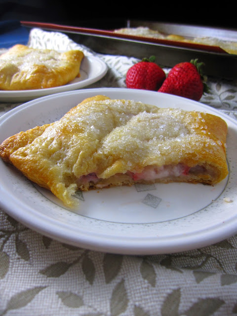 Easy Strawberry Raspberry Cream Cheese Danishes made with refrigerated crescent rolls, fresh strawberries and raspberry jam.