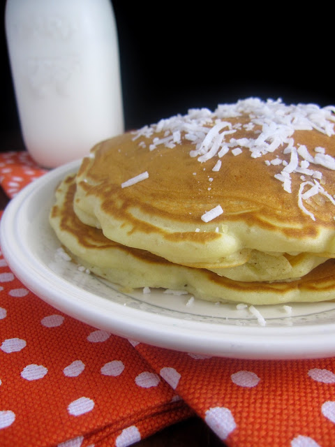 Fluffy coconut pancakes makes a delicious quick and easy breakfast recipe. Made with coconut milk and shredded coconut.