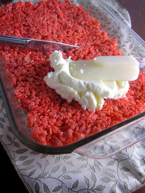 Red and White Rice Krispies Treats with Buttercream Frosting that makes a quick and easy dessert for Canada day