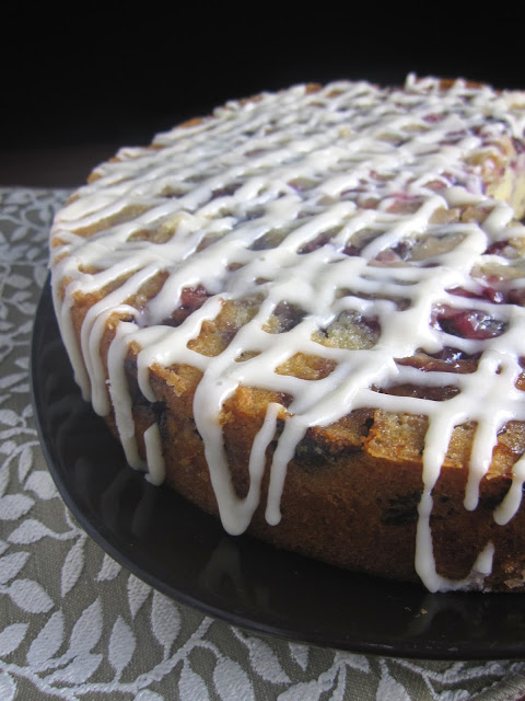 Fresh cherry coffee cake with cream cheese frosting makes the best dessert. It has fruit, so can we have it for breakfast too?