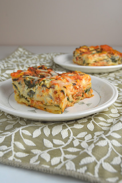 This spinach lasagna is loaded with ricotta cheese and spinach, making it total comfort food. It tastes even better as leftovers!